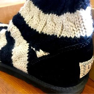 Brand New UGG Classic Tall women’s size 7 buttercream and black sweater boots!